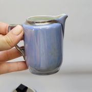 Art deco coffee service in fine iridescent blue porcelain, metal and wood
