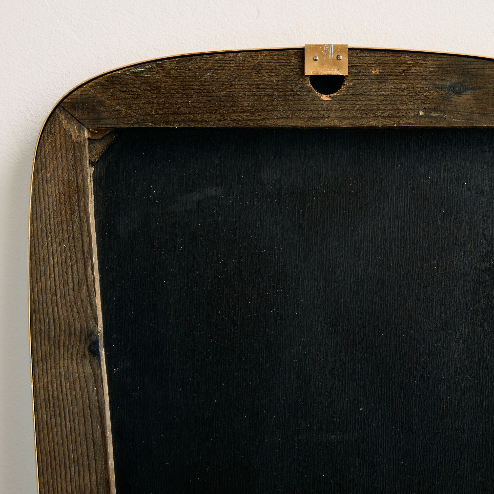 Framed metal mirror