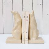 Cracked ceramic bookends with a couple of bears