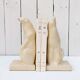 Cracked ceramic bookends with a couple of bears