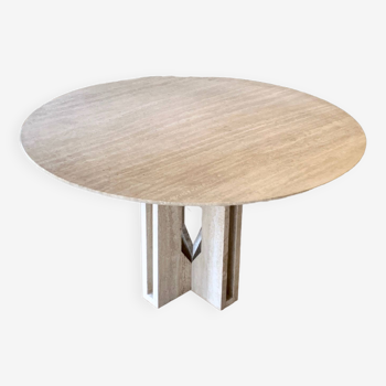 Round travertine dining table by Claude Berraldacci