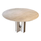 Round travertine dining table by Claude Berraldacci