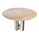 Round travertine dining table by Claude Berraldacci