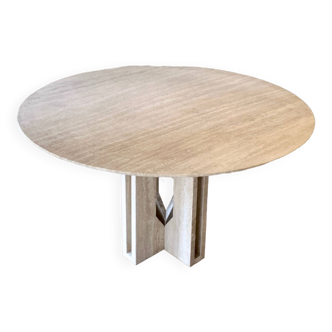 Round travertine dining table by Claude Berraldacci