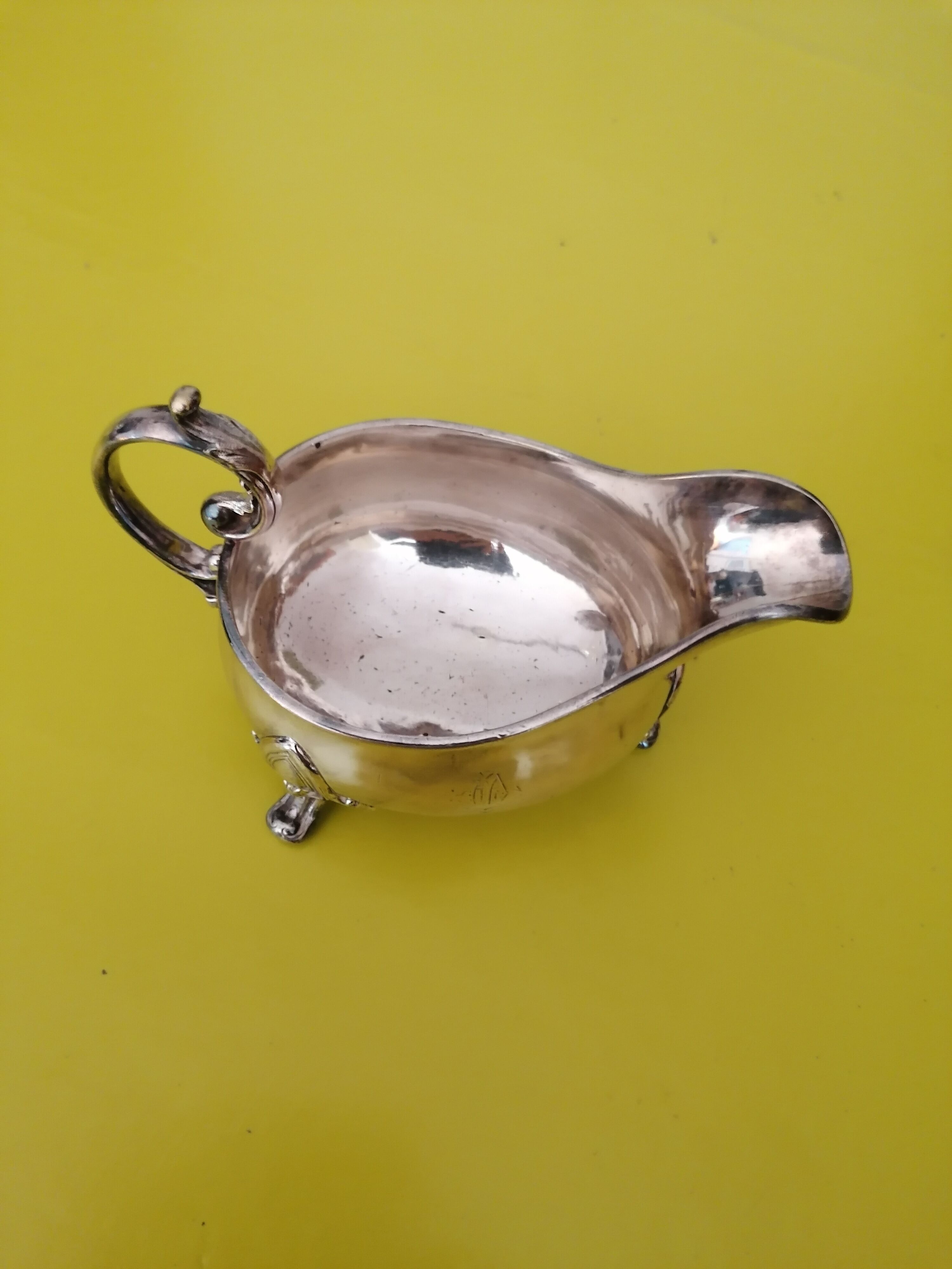 Old silver metal saucer