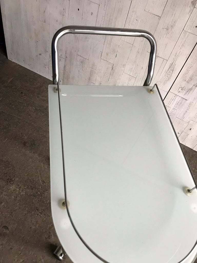 Chrome and transparent glass rolling dessert trolley, French Regency style from the 1960s.