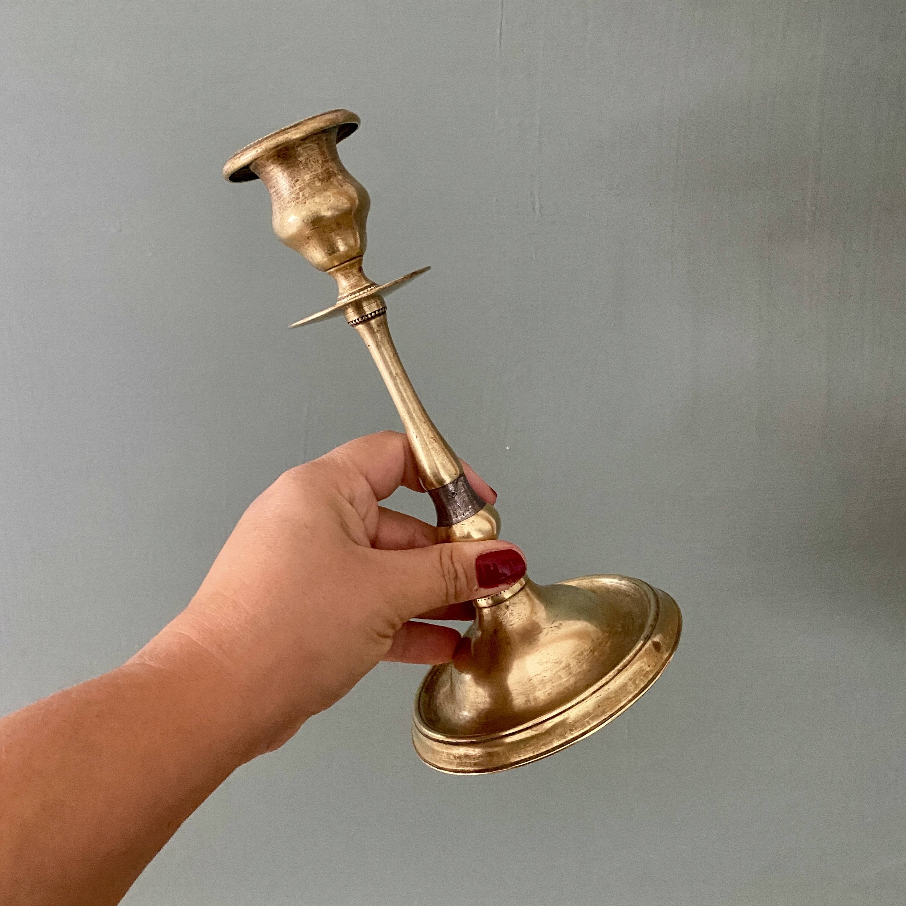 Antique brass candlestick holder
