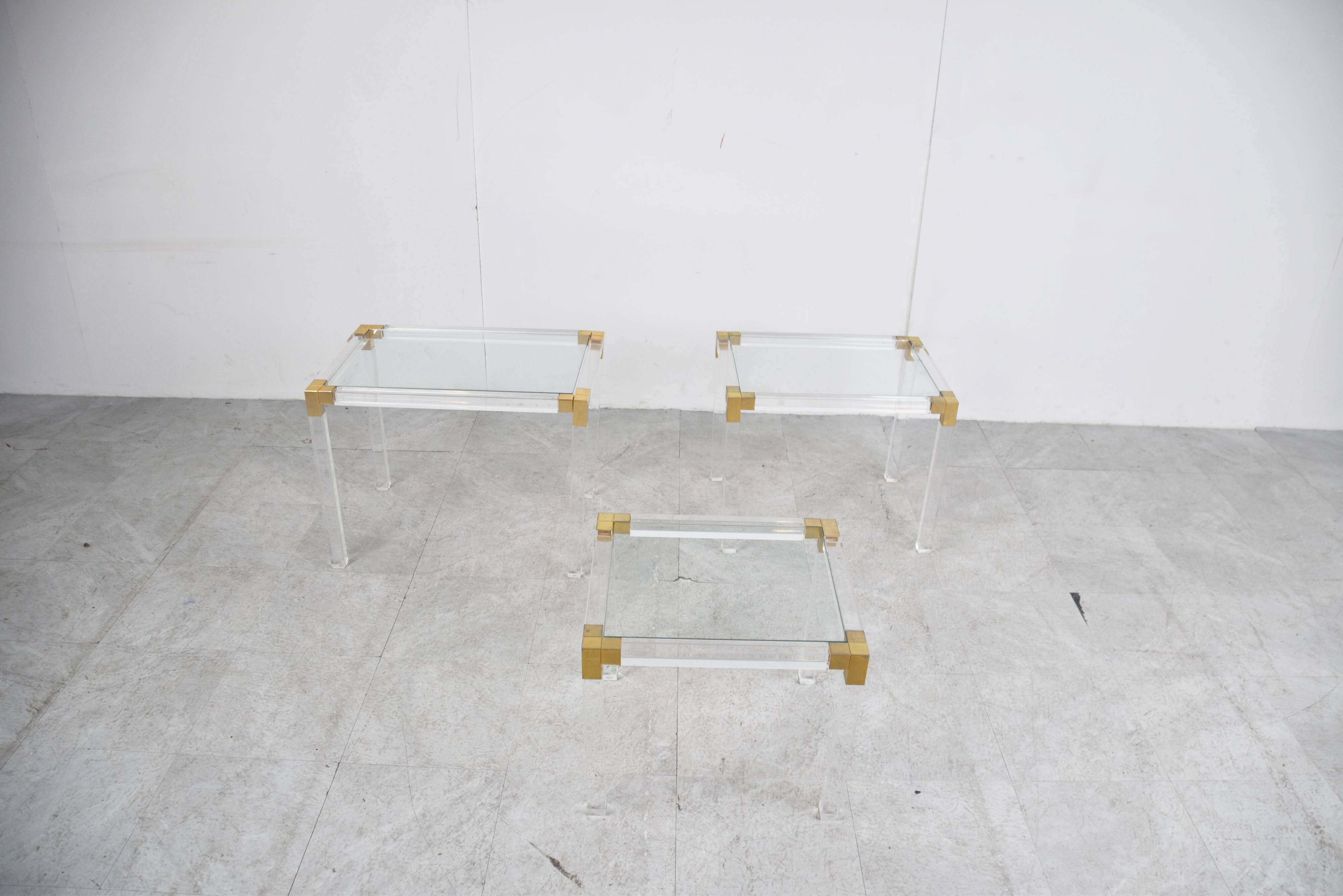 Vintage lucite and brass nesting tables, 1970s