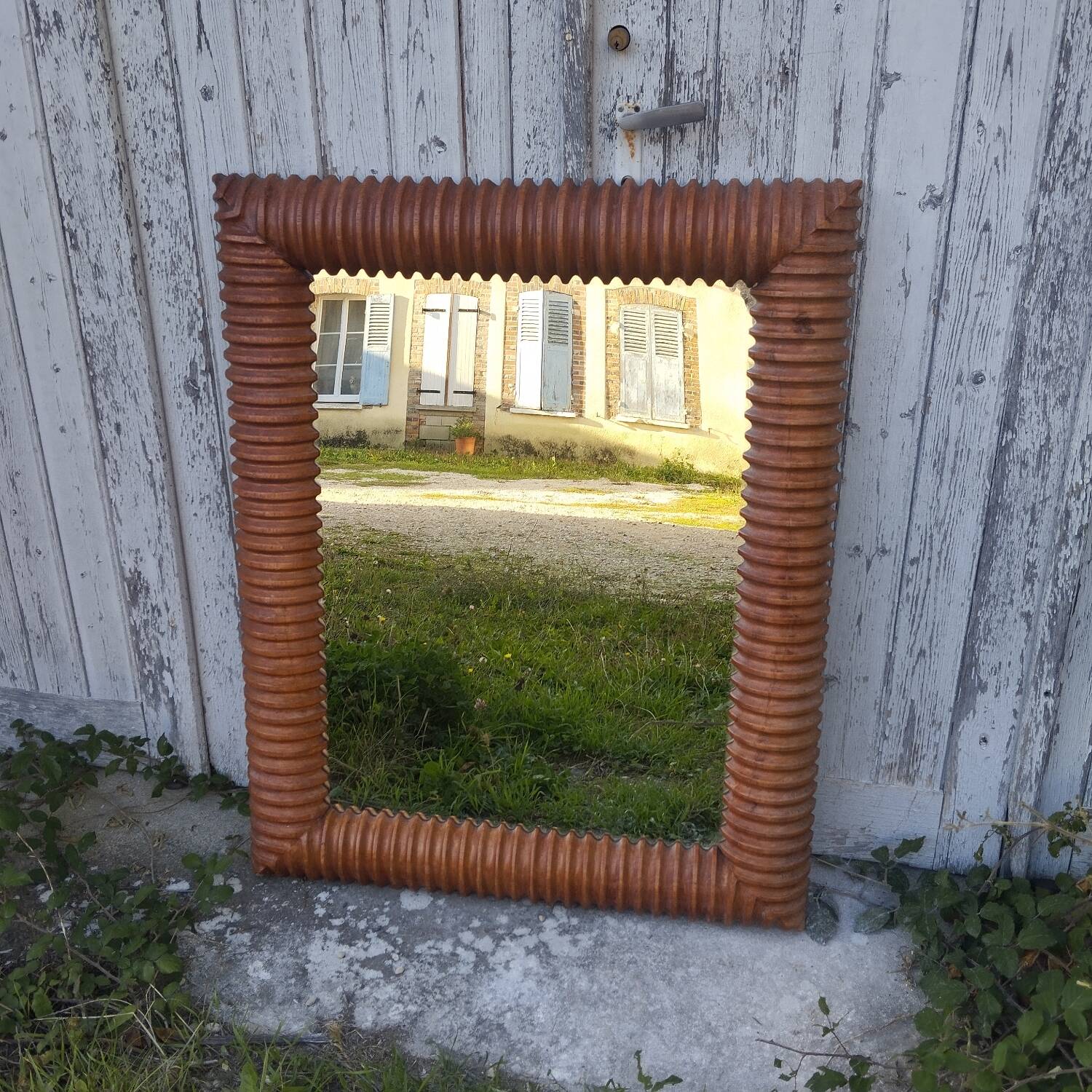 Carved wooden frame mirror