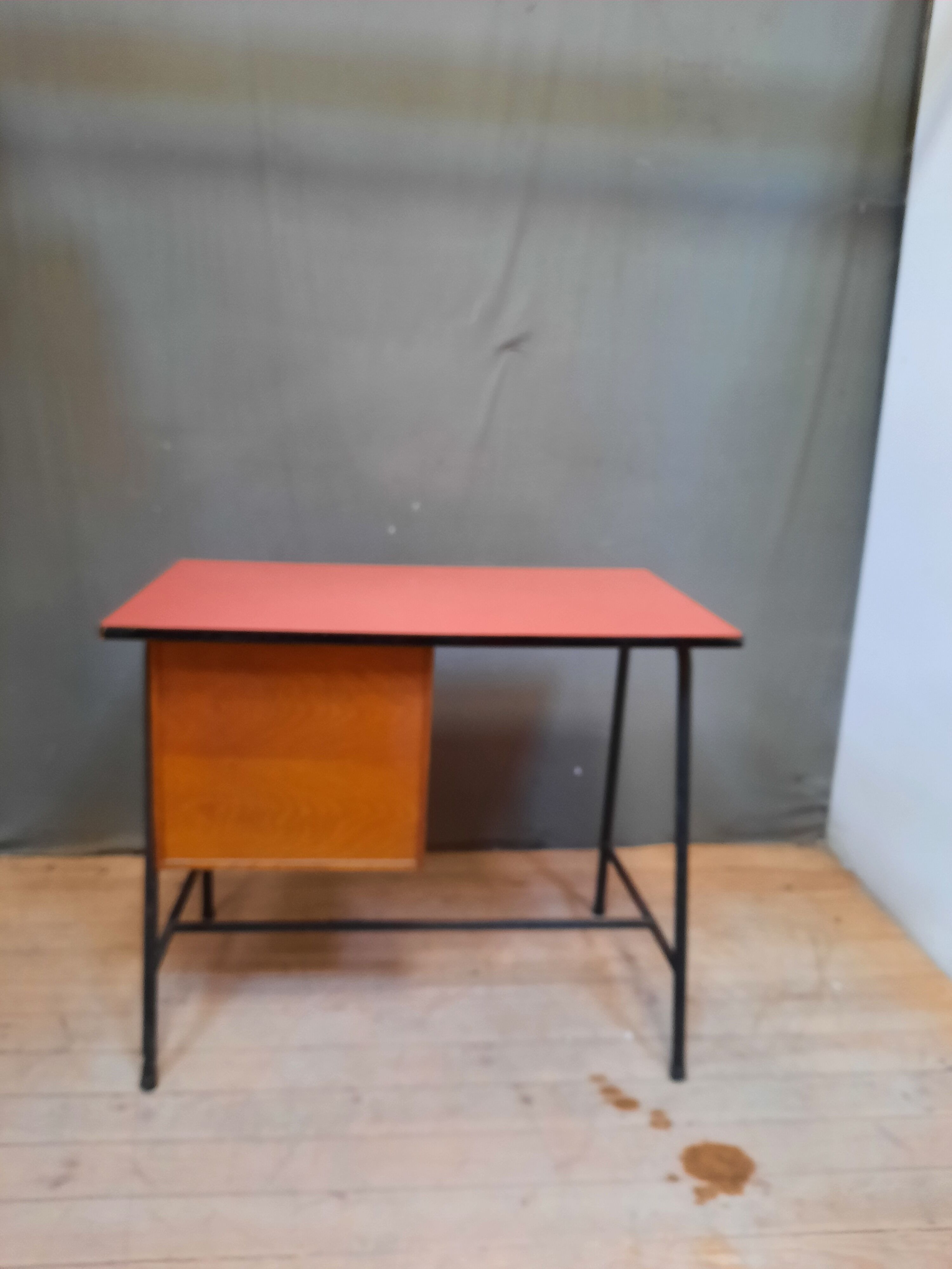 Red vintage desk and its chair