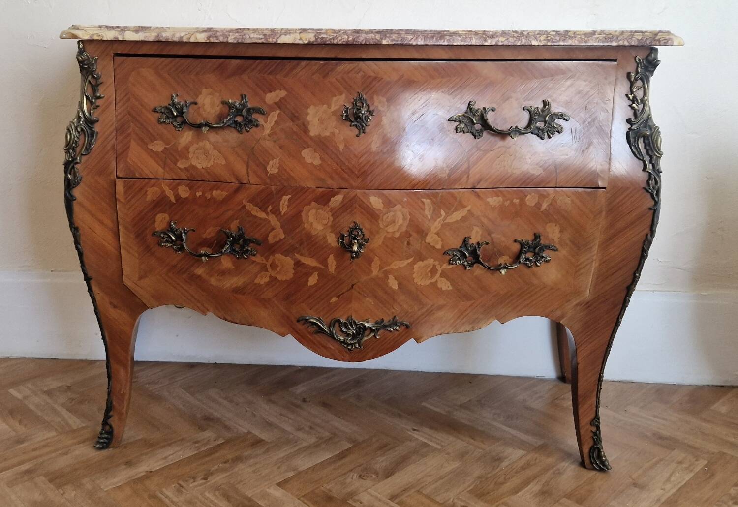 Louis XV style commode, pink and ochre marble.