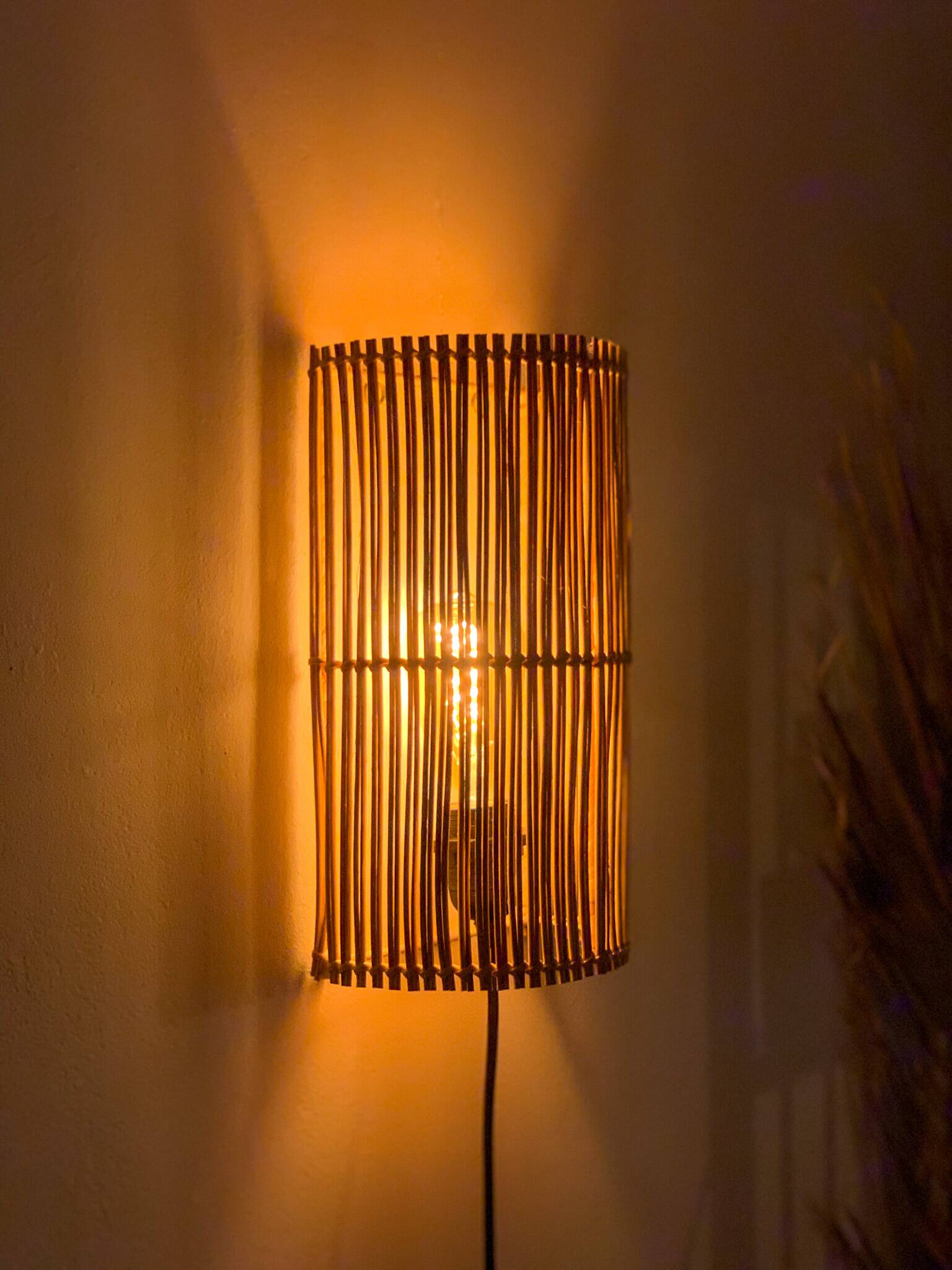 Natural rattan wall light