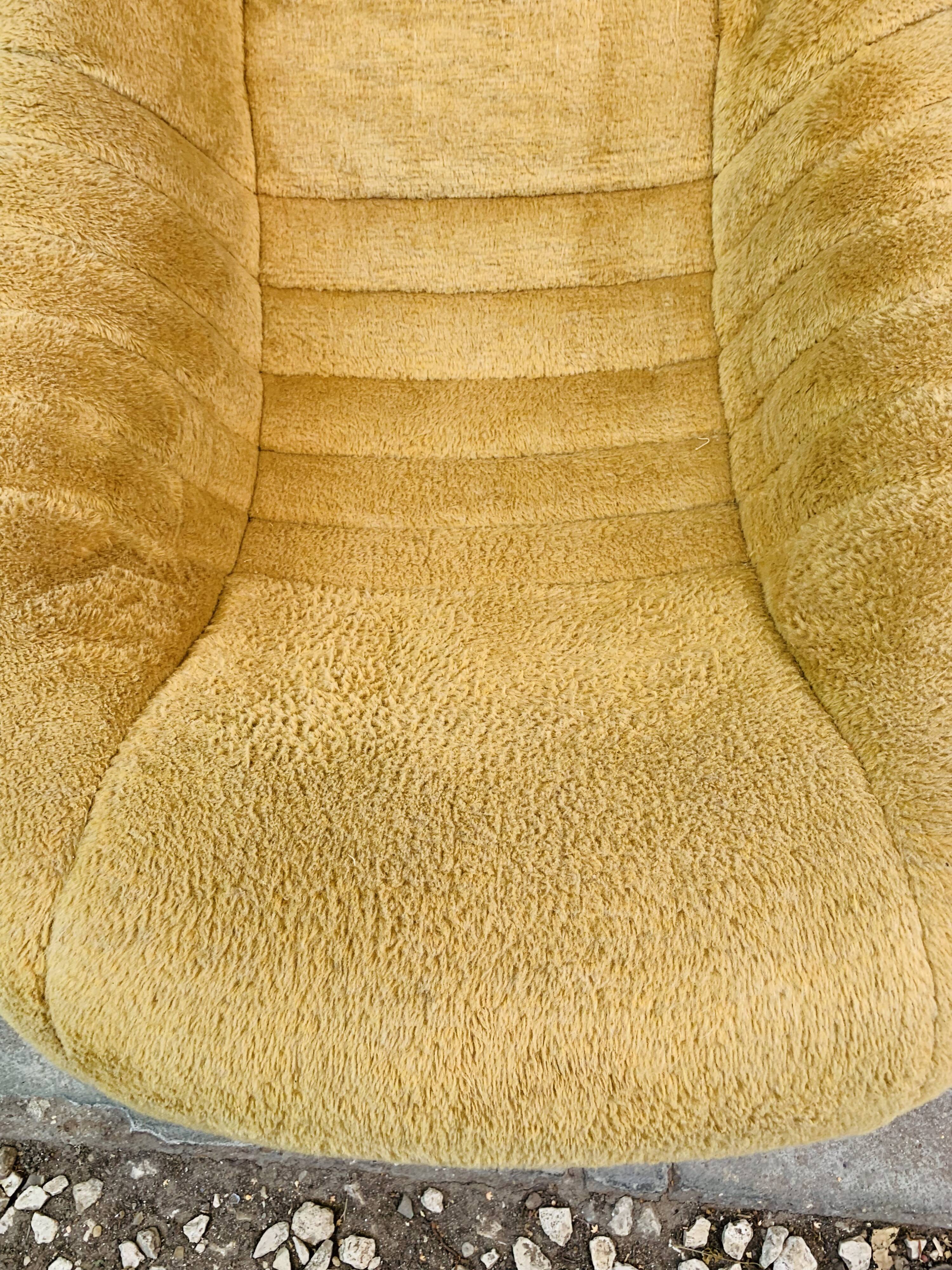 Space age mustard armchair