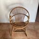 Rattan armchair with vintage design armrests