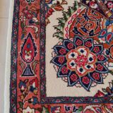A pair of Persian rugs 70 x 100 cm