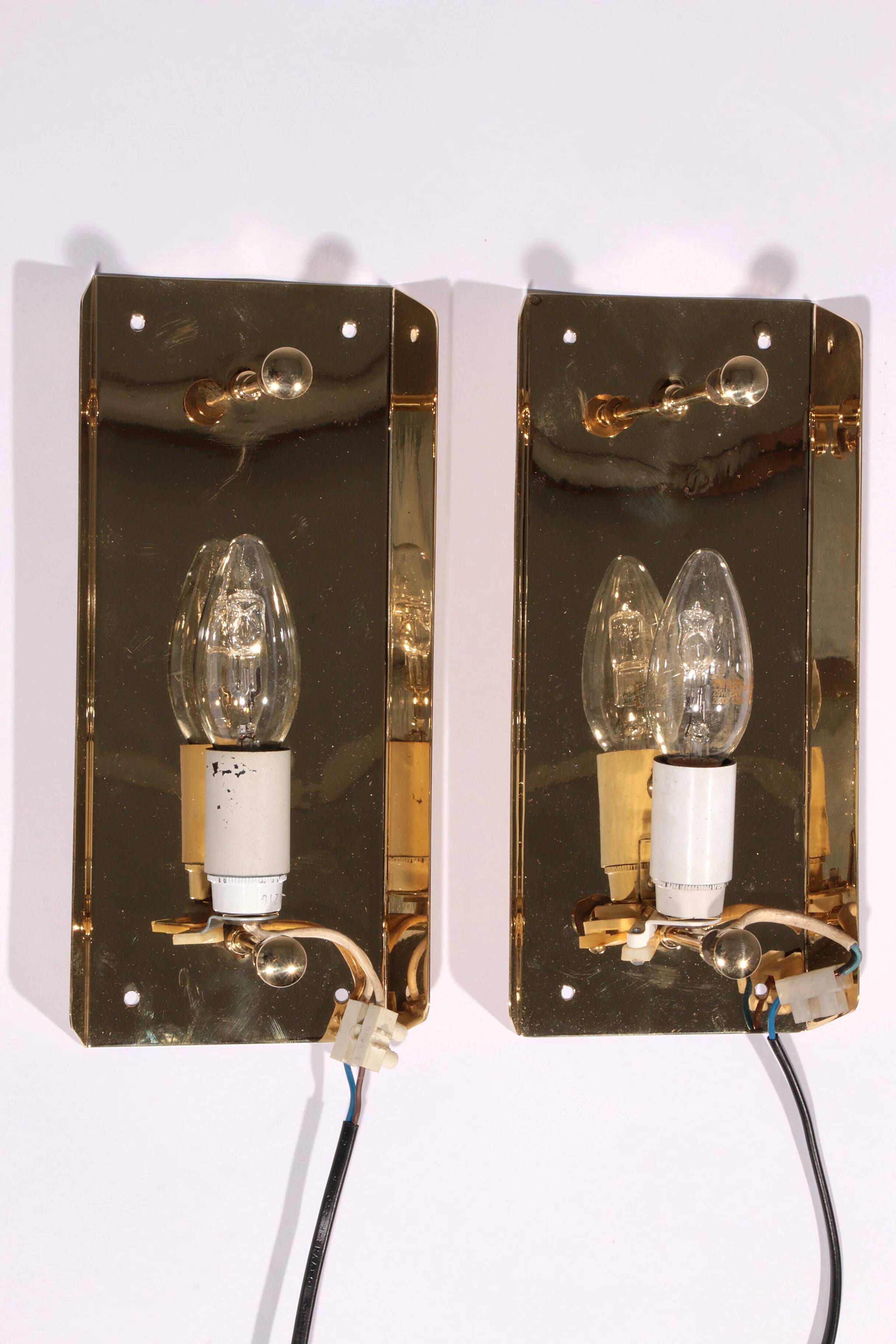 Wall lamps by Carl Fagerlund, Orrefors glass by Lyfa Denmark model Gefion