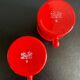Red enameled sheet metal mug