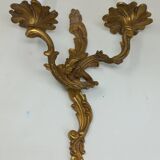 Pair of Louis XV style two-light bronze wall sconces