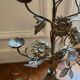 Antique metal candlestick with floral decoration – Mexico
