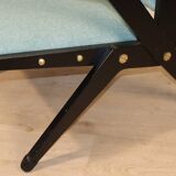 Vintage armchair from the 1960s in black wood and fabric.