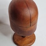 Old wooden hat shape on foot, 1900