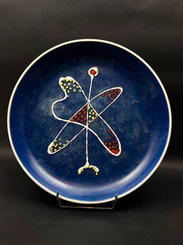 Large decorative dish signed André Baud, diameter 37 cm, enamelled decoration on a deep blue background