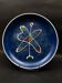 Large decorative dish signed André Baud, diameter 37 cm, enamelled decoration on a deep blue background