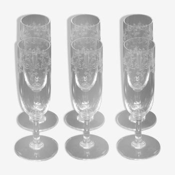 Suite de 6 flûtes en cristal de Baccarat, modèle Sévigné, signées