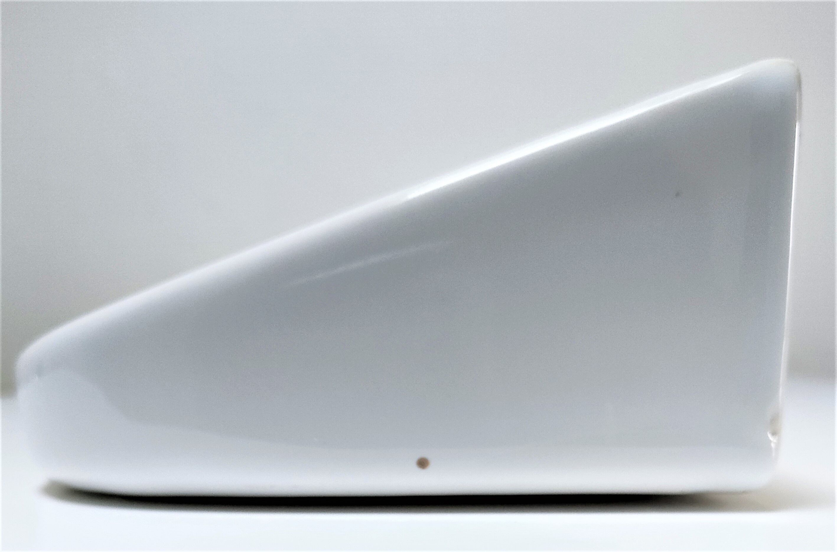 Vintage white glazed ceramic wall shelf