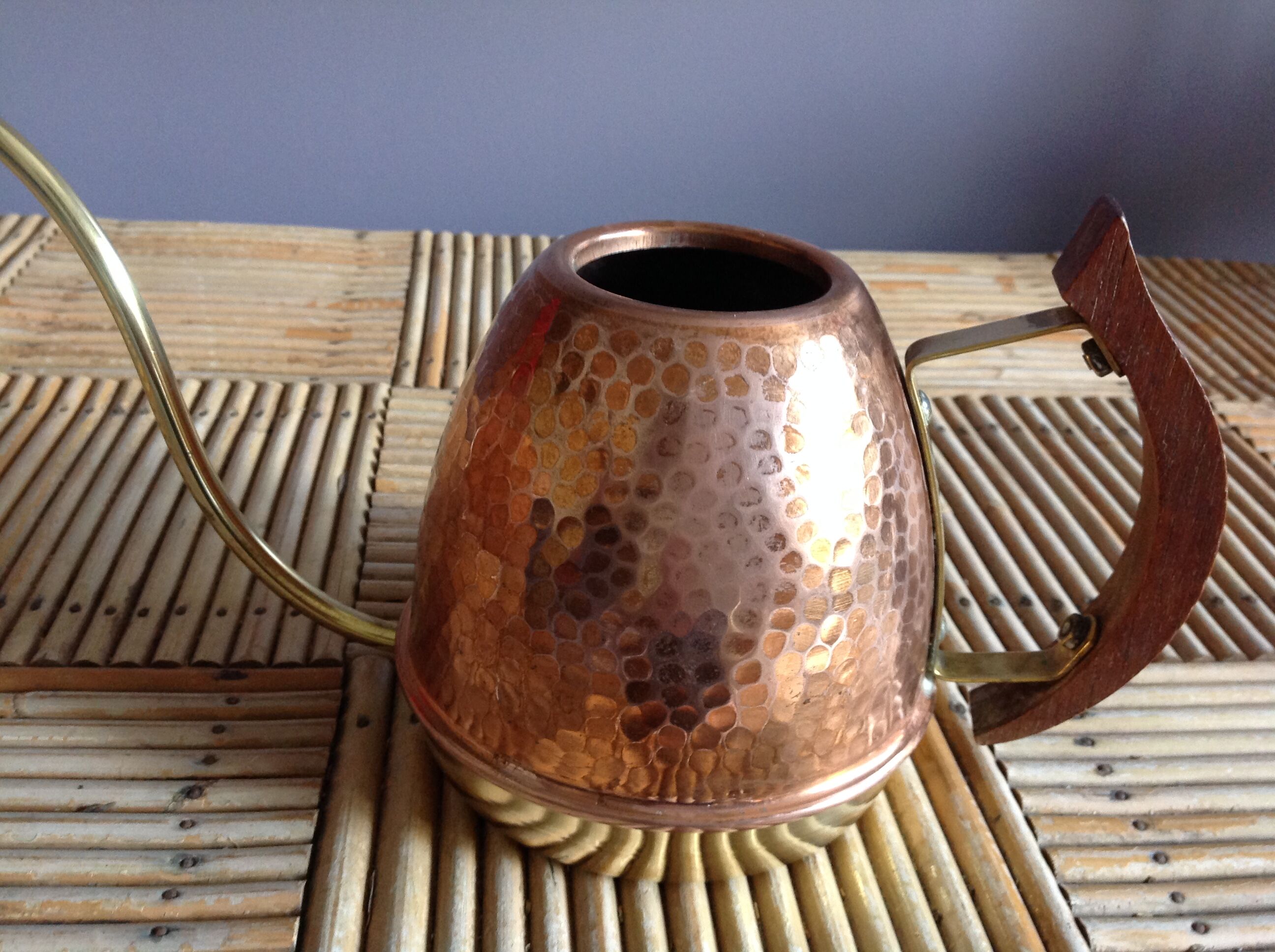Copper and brass watering can