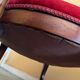 Bergère armchair in Napoléon III style, wood and burgundy velvet.