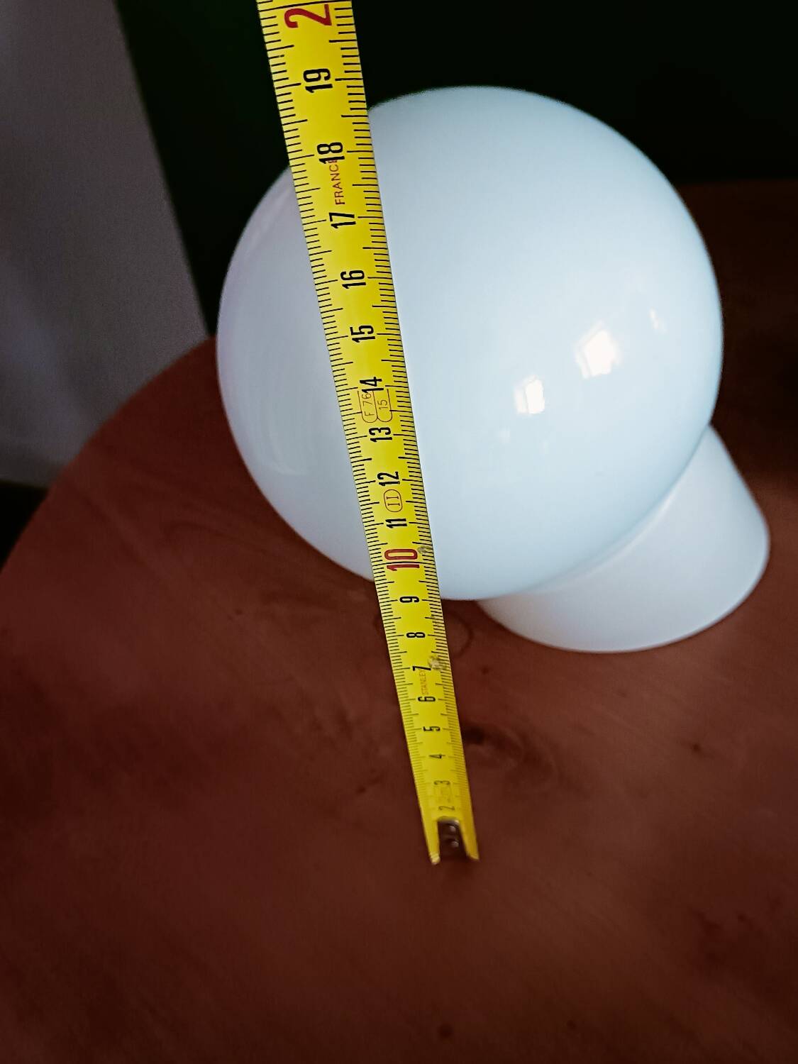 Two opaline glass globe wall lights