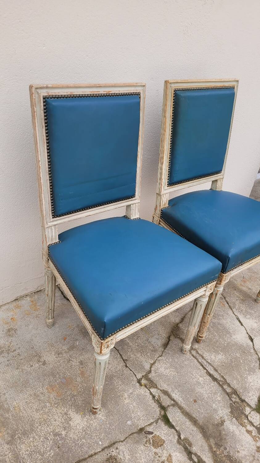 Pair of antique Louis XVI style chairs with patina