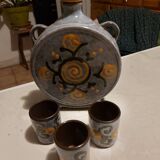 Earthenware carafe with 3 small glasses