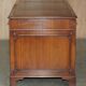 Partner desk Bevan Funnell in hardwood with leather top and gold leaf gilding.