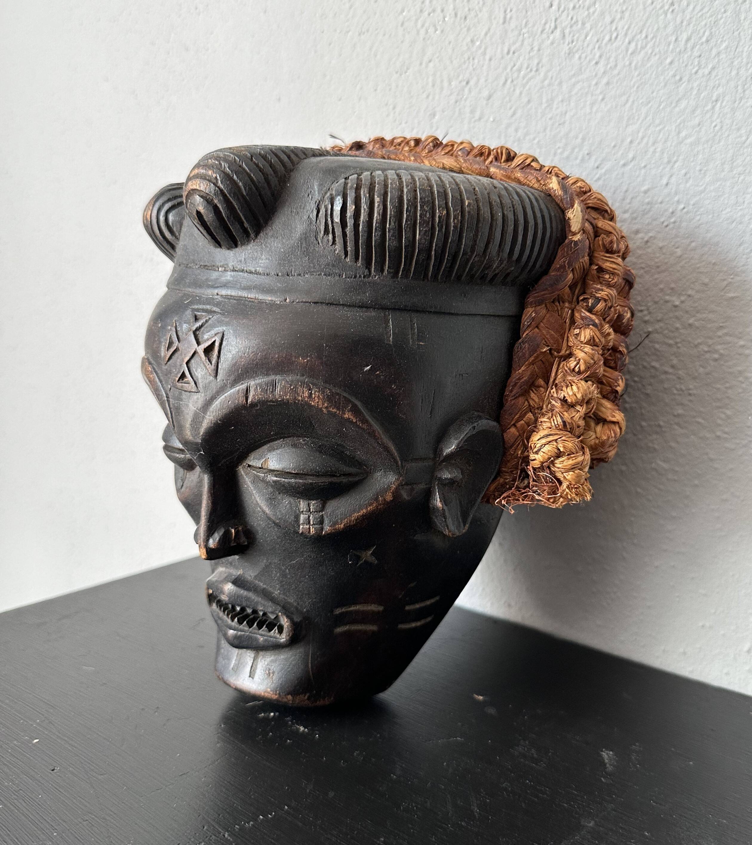 Black and orange tribal mask