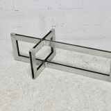 Coffee table with steel base and smoked glass slab. Circa 197