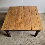 Wooden coffee table with turned legs