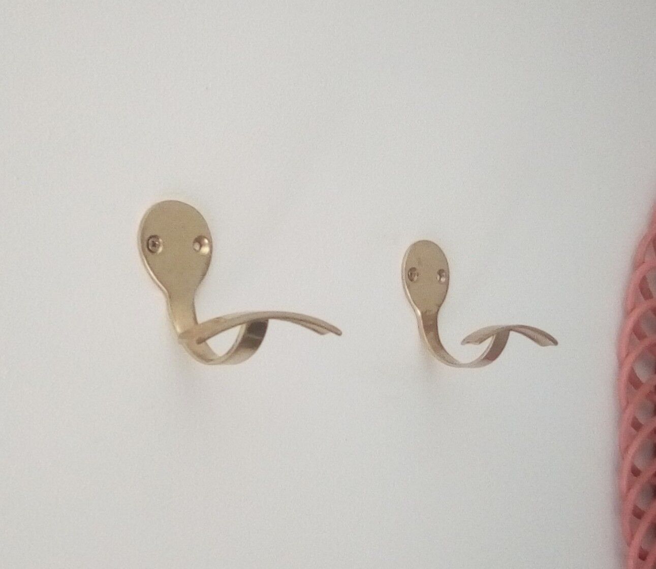 Pair of coat racks in gilded steel 70s/80s