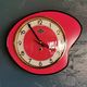 Vintage formica clock silent asymmetrical wall pendulum "Doby Matic red"