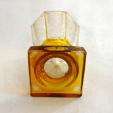 Art Deco vase engraved with flowers, faceted body on a pedestal.