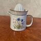 Citrus press vintage carafe floral pattern