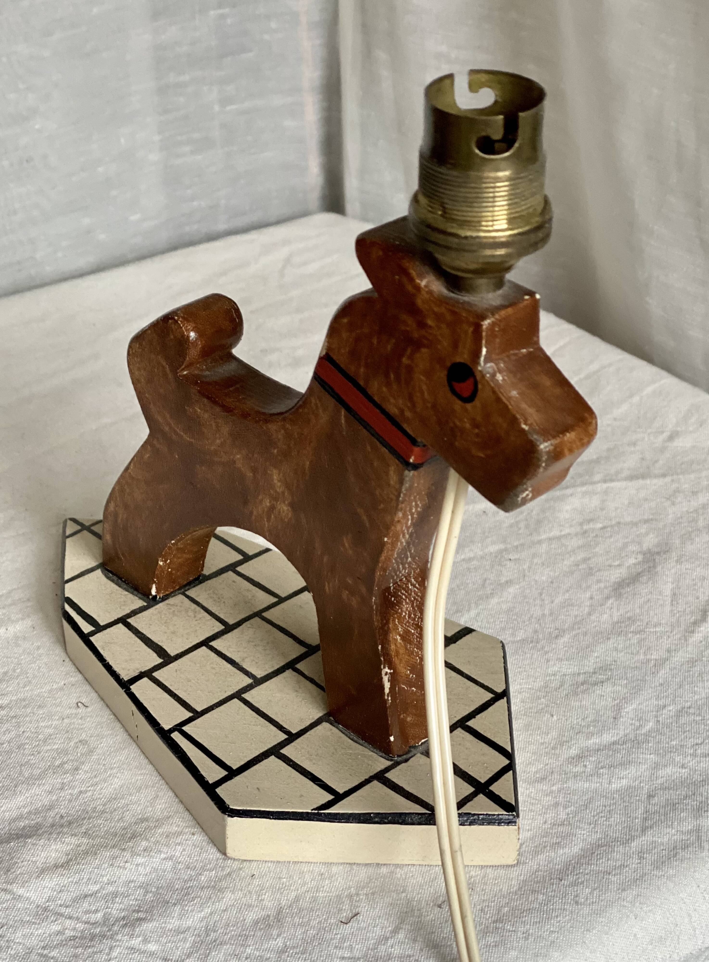 Vintage 1970s polychrome wooden lamp in the shape of a dog.