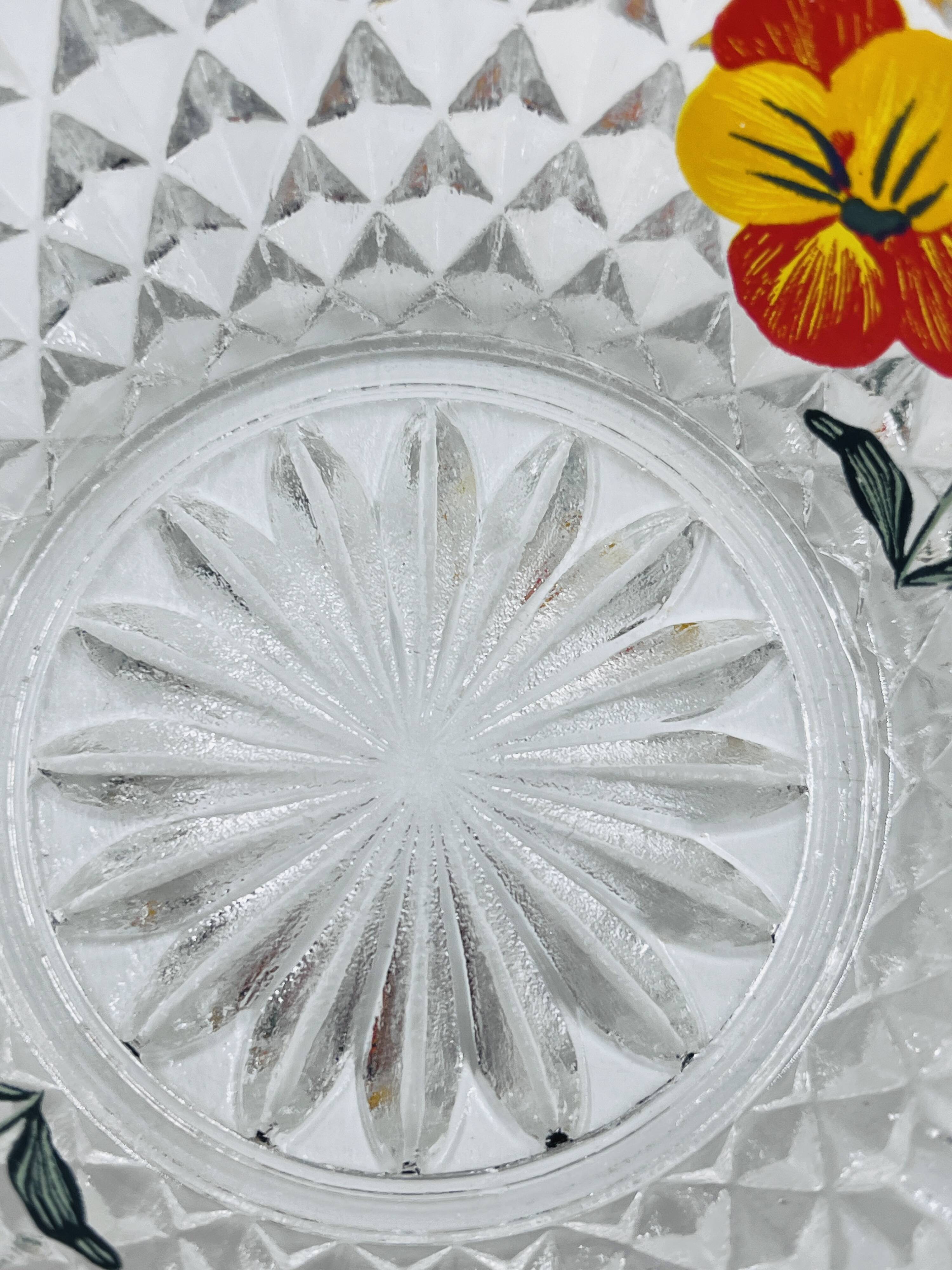 Vintage glass fruit salad serving set with a pansy design.