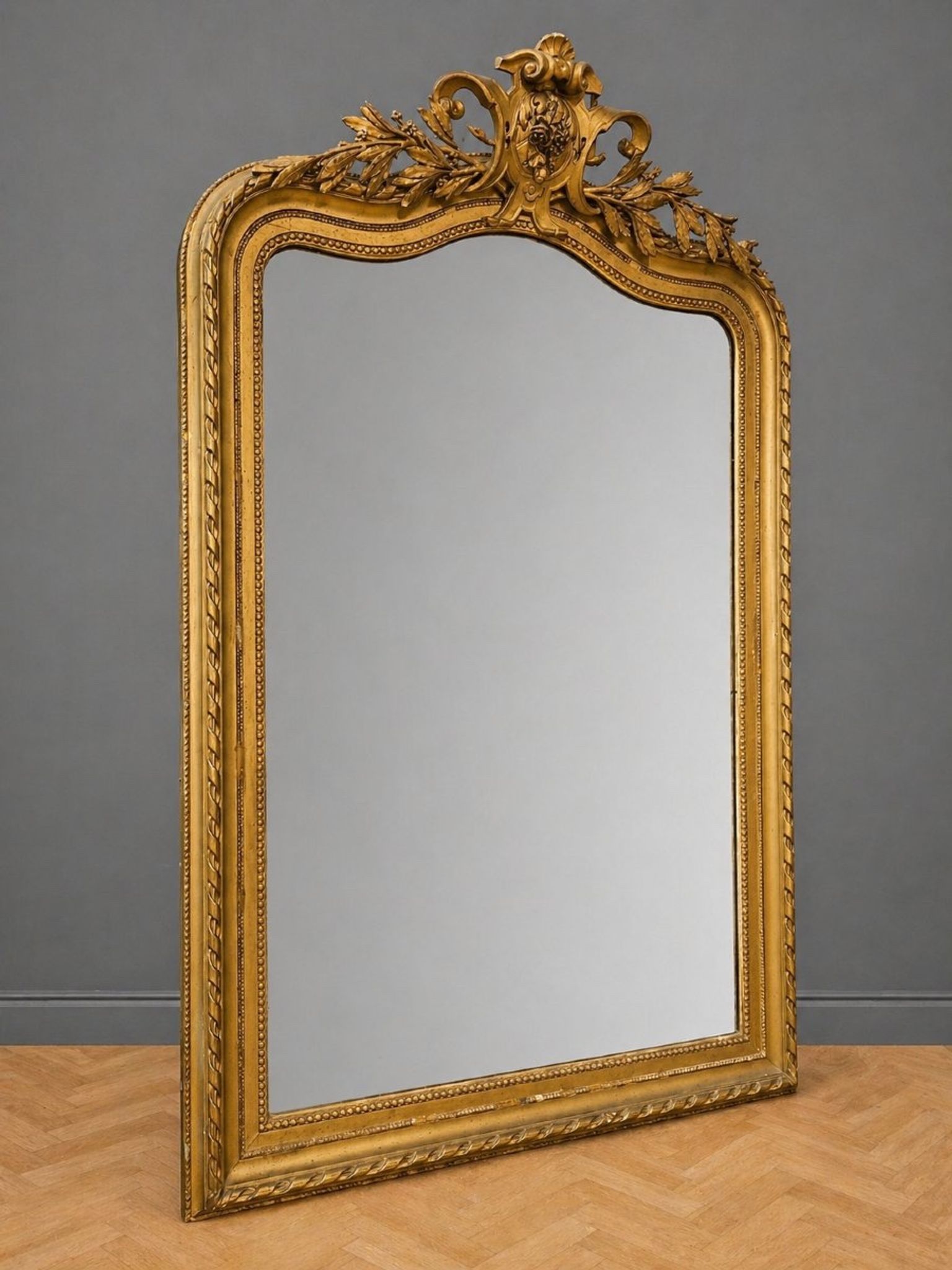 Large carved and gilded wooden mirror in Louis XV style