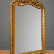 Large carved and gilded wooden mirror in Louis XV style