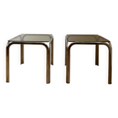 Duo of chrome and smoked glass coffee tables.