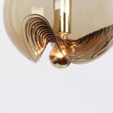 One of the four large smoked glass pendants by Peill & Putzler, Germany, 1970s.