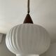Louis Kalff pendant light in opaline and teak from the 1960s