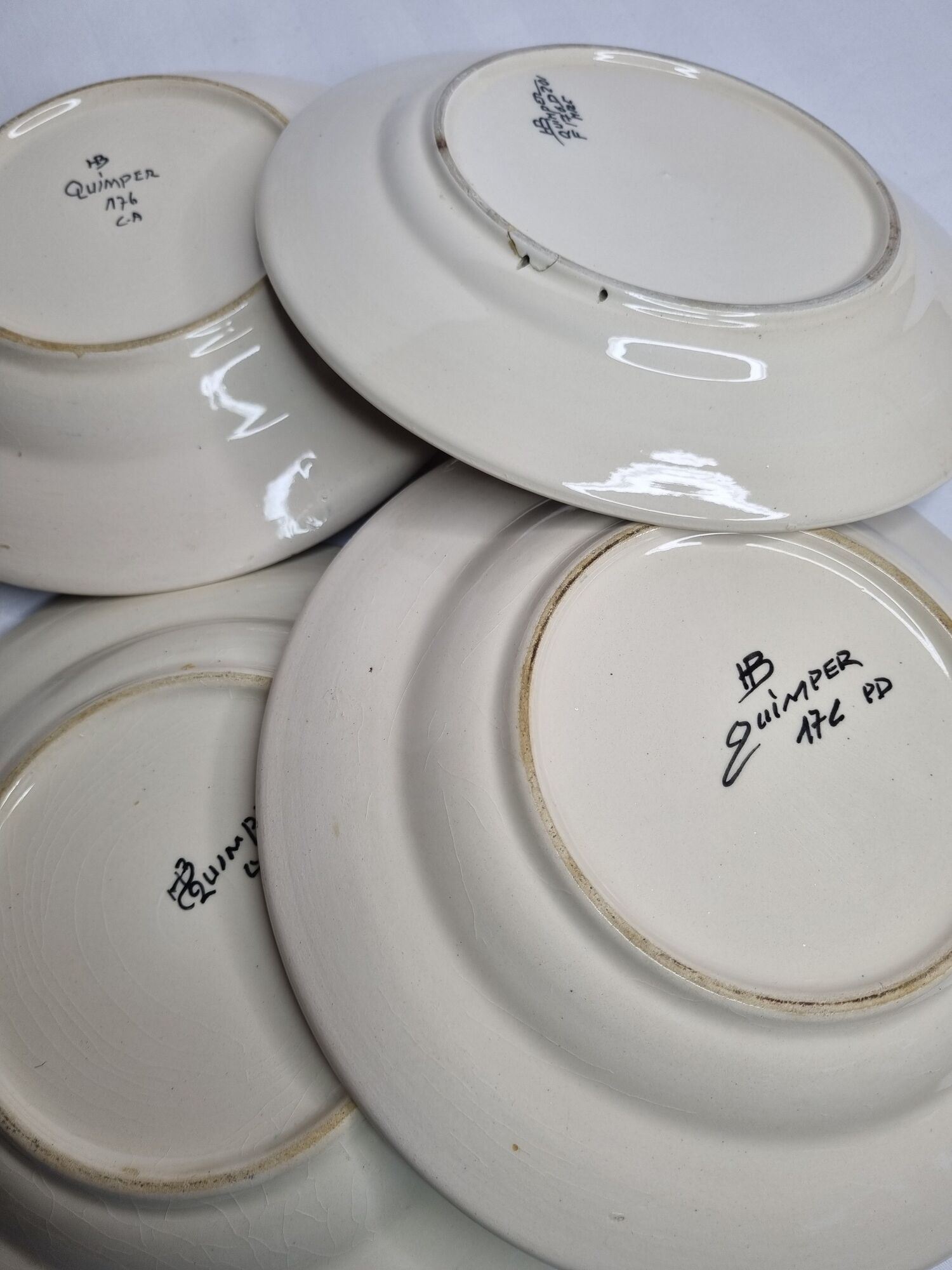 Set of 3 hollow plates and a henriot Quimper flat plate with traditional décor